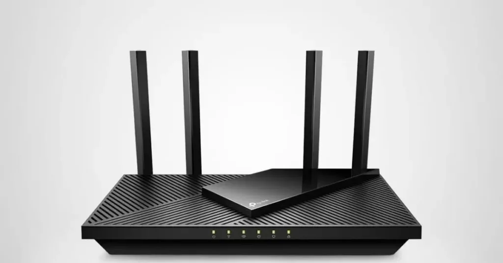 Black wireless WiFi router with four external antennas for high speed internet connectivity